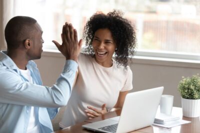 happy african couple celebration victory feels overjoyed