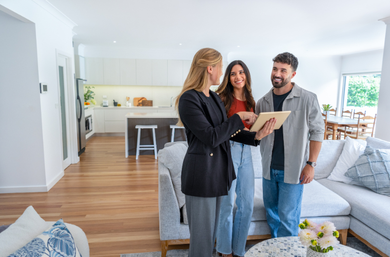 couple working with a Realtor in selling their home