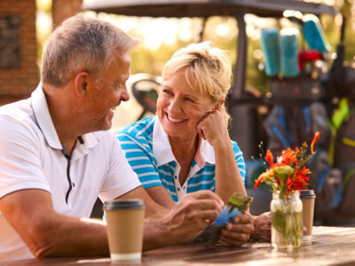 elderly couple enjoying the luxury living in ibis palm beach