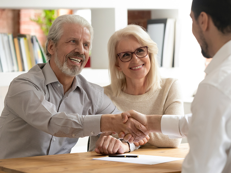 elderly couple working with a ibis palm beach realtor