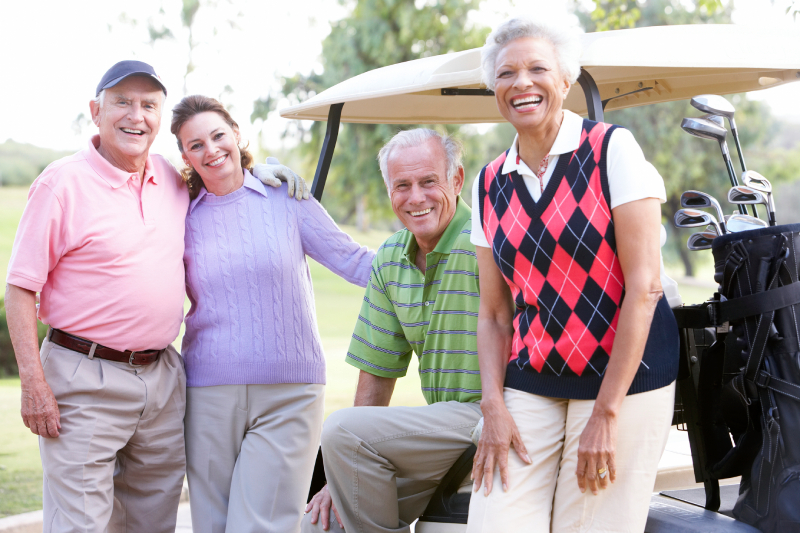 Portrait Of Friends Enjoying Golf