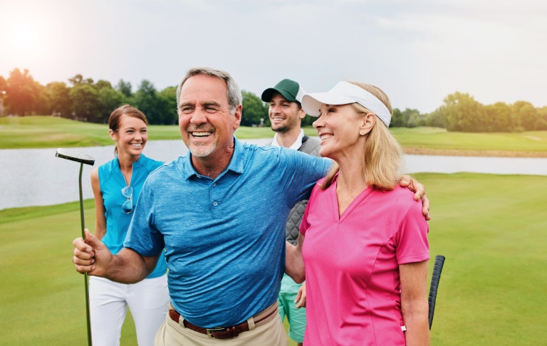 Family playing golf